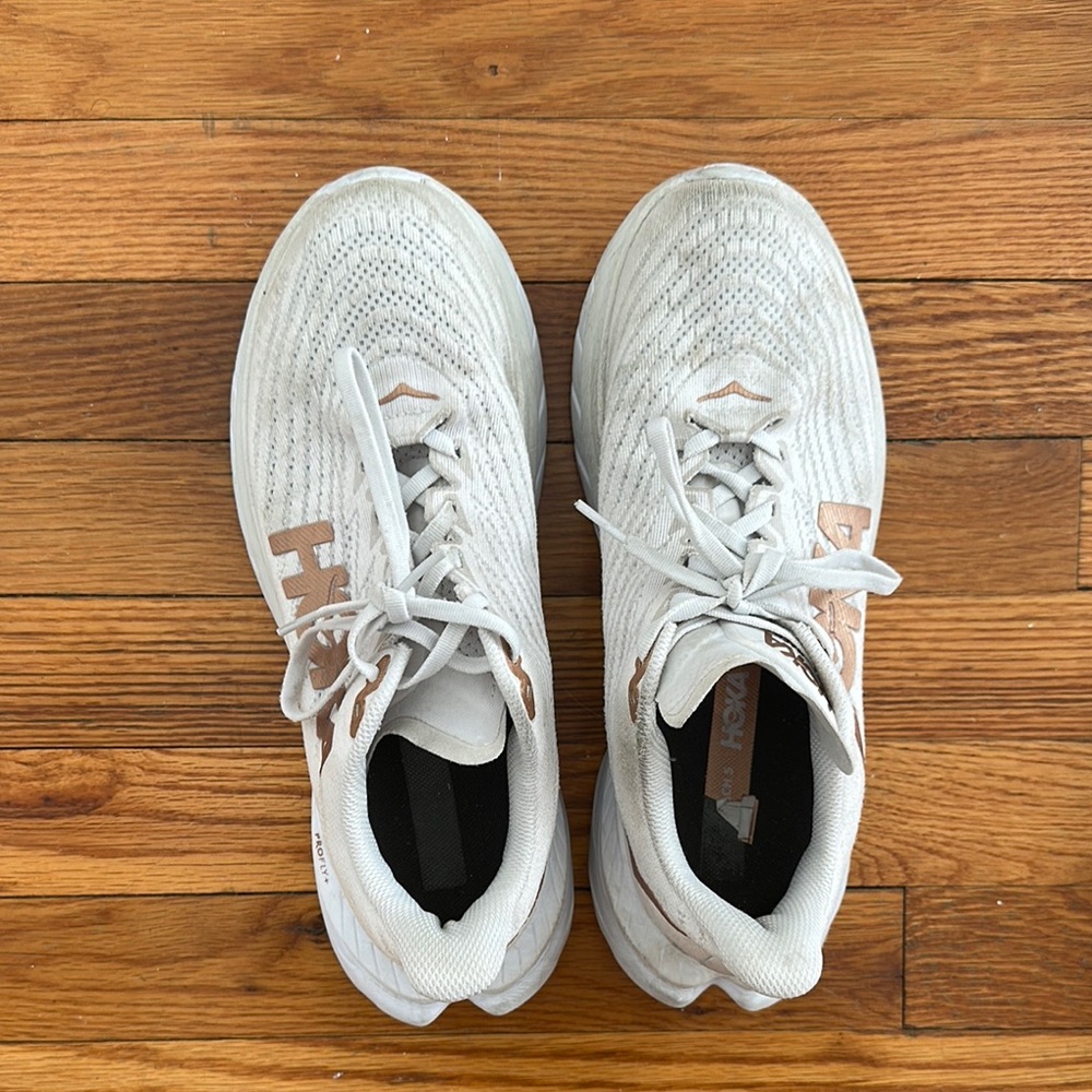 White and Tan Athletic Shoes